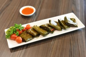 Banana leaf wrapped cottage cheese